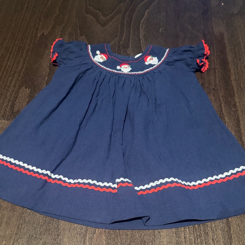Adorable Navy and Red Kids Dress with embroidered Santa Smocked design